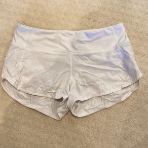 white speed up shorts, no stains, gently used, lined, 2.5 inseam, size 2